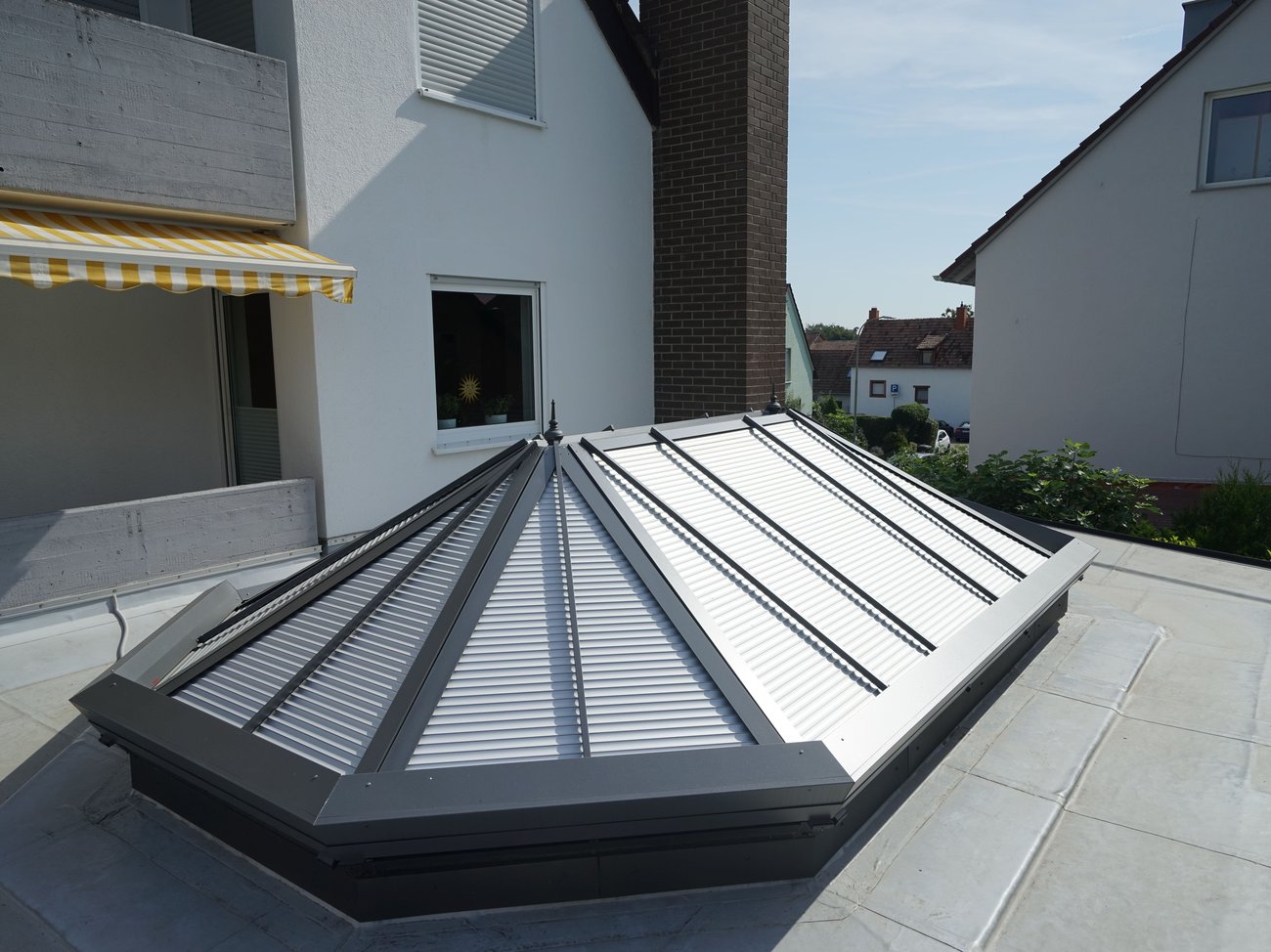  Conservatory roller shutter on a roof